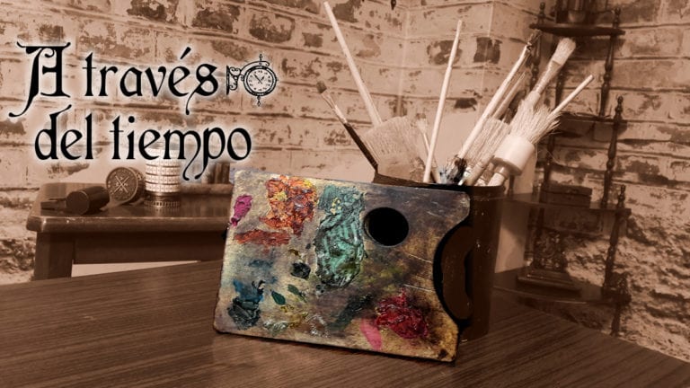 Escena de un estudio de arte en tonos sepia en Granada con pinceles, una paleta de colores y el texto "A través del tiempo - Un juego de El Gato Escape Room (Granada). - ForTwo - Planes para parejas