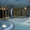 Descubra la tranquilidad con el Circuito spa para 2 personas en Qi Spa (Bilbao), equipado con jacuzzis interiores, una fuente de agua tranquila y un techo con temática de cielo nublado que crea una experiencia de otro mundo. - ForTwo - Planes para parejas