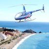 El Vuelo en helicóptero por Costa Tropical Oeste de Granada te lleva sobre la ciudad costera, ofreciendo impresionantes vistas de la playa de arena de Granada y del extenso océano que se extiende hasta el horizonte. - ForTwo - Planes para parejas