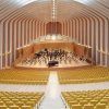 Descubra la espaciosa sala de conciertos, con su arquitectura curva y butacas amarillas, donde se presenta la famosa Ópera de Valencia. Complemente su visita con una Visita guiada a la Ópera de Valencia para descubrir las historias ocultas y las maravillas arquitectónicas. - ForTwo - Planes para parejas