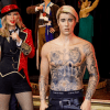 Las figuras de cera de una mujer con chaqueta roja y micrófono, y de un hombre tatuado, sin camisa y con pantalones negros, se alzan imponentes en el Museo de Cera de Madrid. Estas creaciones esculpidas de gran realismo forman parte de las impresionantes exposiciones que puedes explorar con tus Entradas al Museo de Cera de Madrid. - ForTwo - Planes para parejas