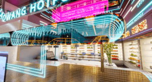 Laowanghotpot ofrece un interior moderno y luminoso con luces de neón, una exhibición de bebidas y una larga barra con sillas. Disfrute de una auténtica experiencia china en este colorido restaurante de hot pot. - ForTwo - Planes para parejas